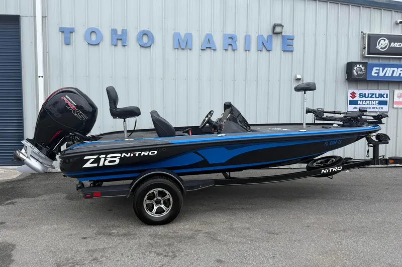 The Image of 2022 Nitro Z18 boat in blue and black at Toho Marine dealership. - 1