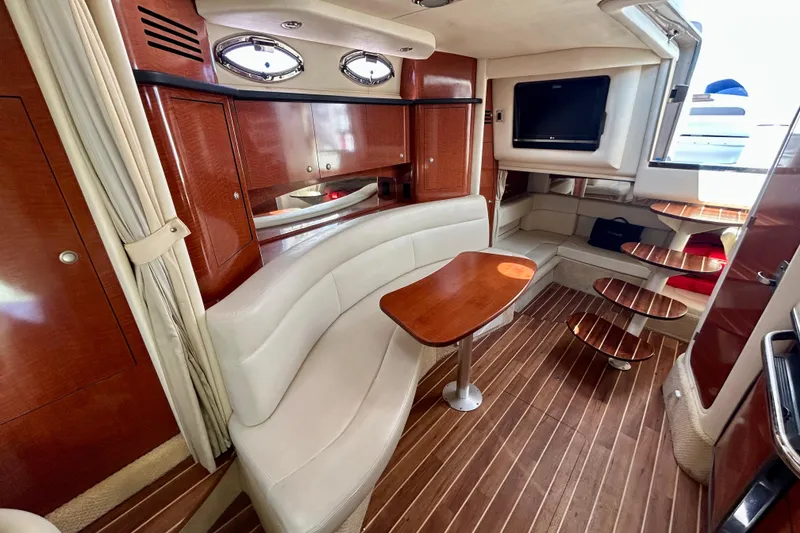 Slide: The Image of Luxurious interior of 2005 Sea Ray Sundancer 320 yacht with elegant wood finishes. - 11
