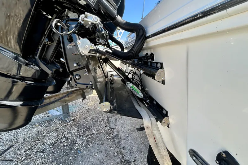 Slide: The Image of Close-up of 2005 Sea Ray Sundancer 320 boat engine and trim tabs. - 4