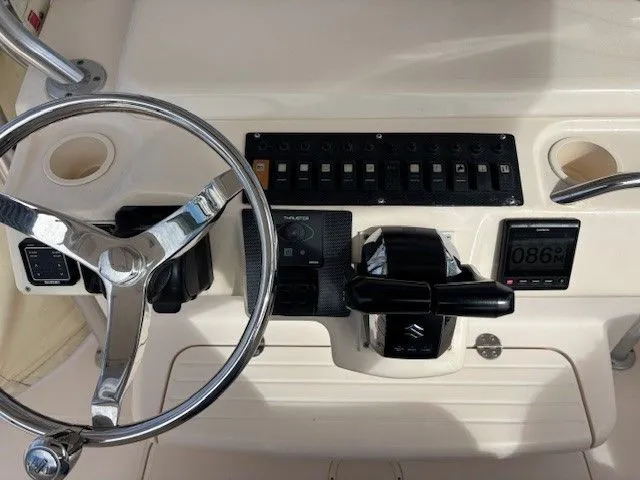 Slide: The Image of Helm console of a 2008 Grady-White Bimini 306 boat. - 10