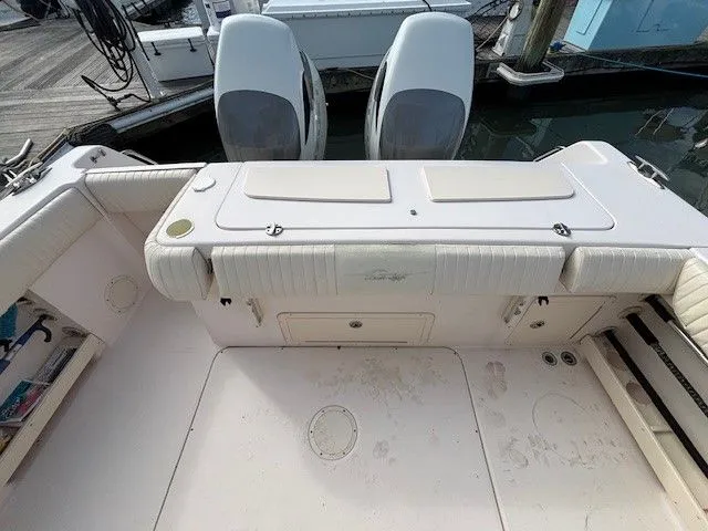 Slide: The Image of 2008 Grady-White Bimini 306 boat rear at dock. - 14
