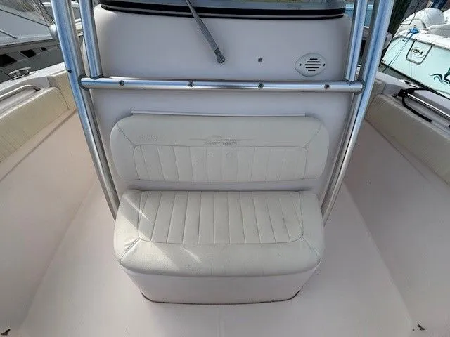 Slide: The Image of Interior of a 2008 Grady-White Bimini 306 boat with seating bench. - 7