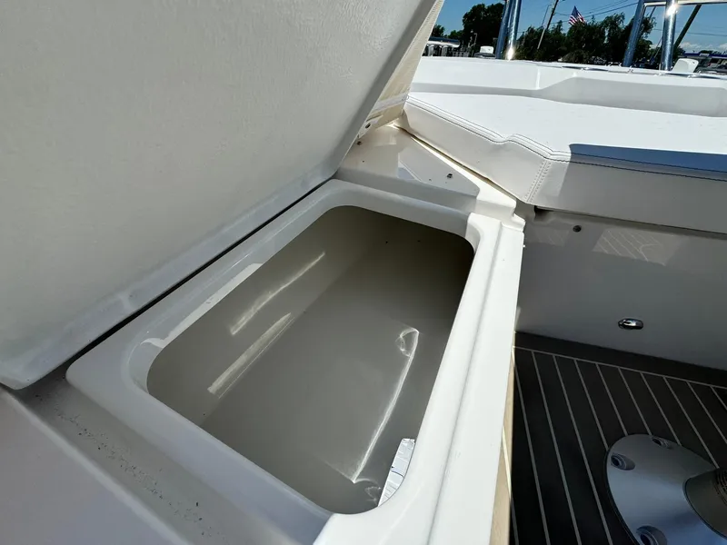 Slide: The Image of Open storage compartment on 2024 Windy SR28 CC boat. - 9