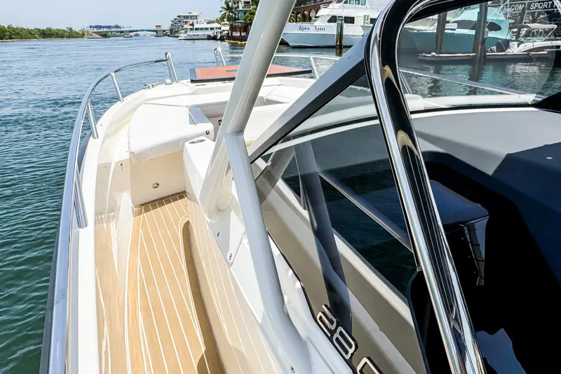 Slide: The Image of The image shows a modern boat with sleek lines and a spacious deck. - 8
