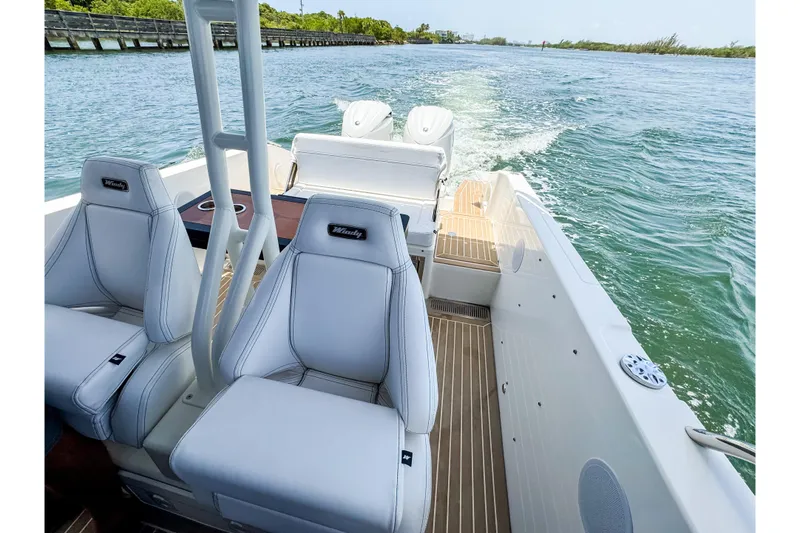 Slide: The Image of The image shows the cockpit of a 2024 Windy SR28 CC on the water. - 16