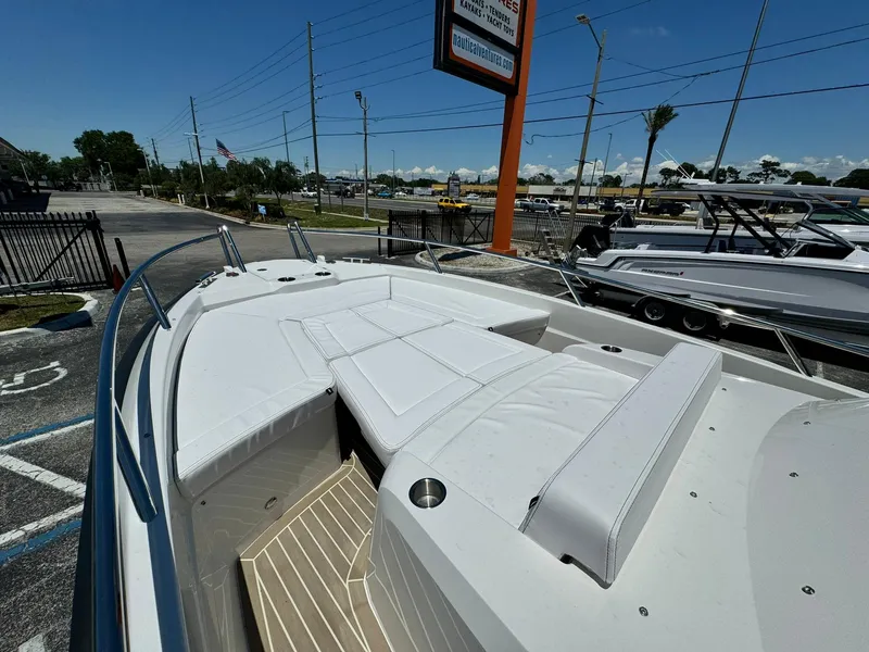 Slide: The Image of 2024 Windy SR28 CC boat with spacious deck and comfortable seating. - 6