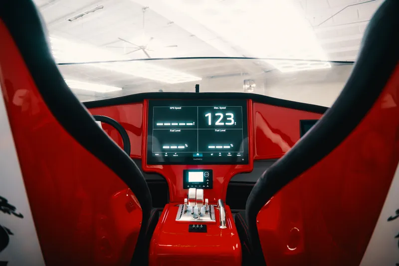 Slide: The Image of Interior view of 2025 Statement 360 CAT with digital dashboard and controls. - 10