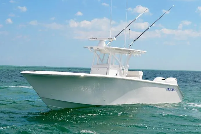 The Image of Manufacturer Provided Image: 2025 SeaHunter 31 Tournament boat on open water under clear sky. - 0