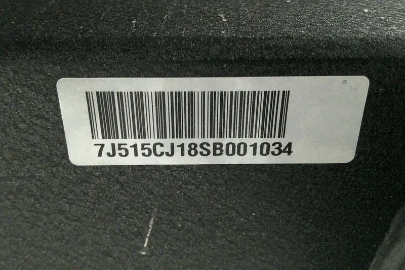 Slide: The Image of Barcode label on 2024 Tahoe T18 with serial number 7J515CJ18SB001034. - 5
