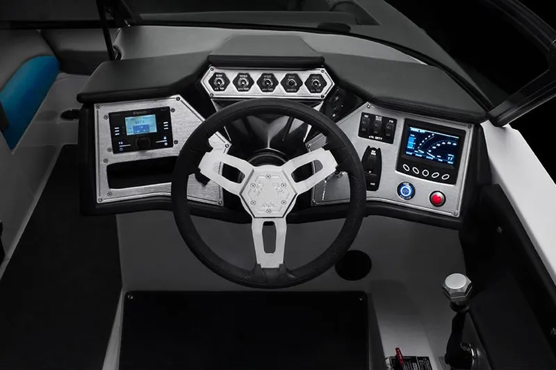 Slide: The Image of Manufacturer Provided Image: 2018 MasterCraft NXT22 boat dashboard with modern controls and steering wheel. - 10