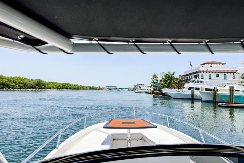 Slide: The Image of View from the cockpit of a Windy SR28 CC overlooking the water and surrounding boats. - 12