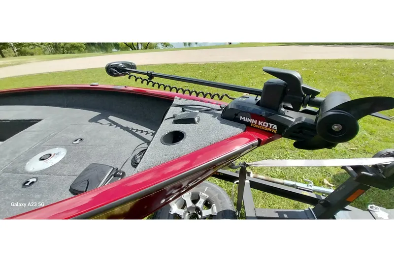 Slide: The Image of 2025 Tracker Super Guide V-16 SC boat with Minn Kota PowerDrive trolling motor. - 9