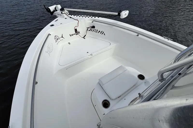 Slide: The Image of 2008 Seapro 206CC boat interior with trolling motor on calm water. - 9