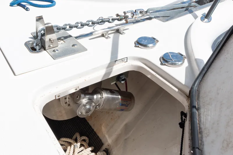 Slide: The Image of Anchor compartment of 2007 Tiara Yachts 3800 Open with chain and winch. - 20
