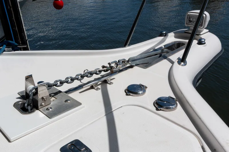 Slide: The Image of Bow of 2007 Tiara Yachts 3800 Open with anchor chain and fittings. - 21