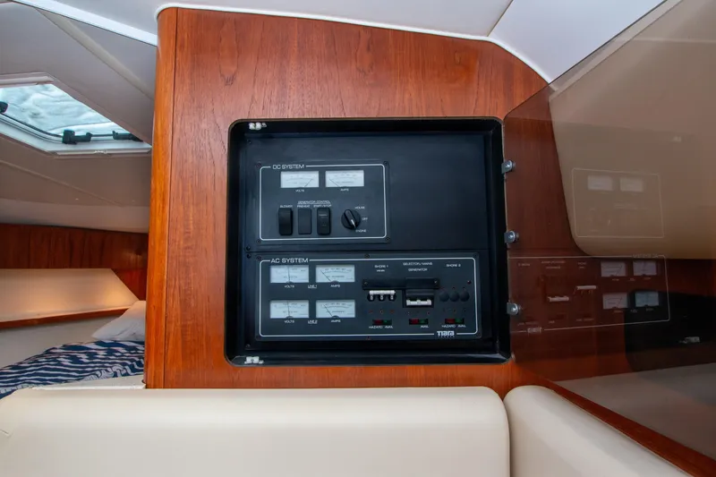 Slide: The Image of 2007 Tiara Yachts 3800 Open electrical panel in cabin interior. - 35