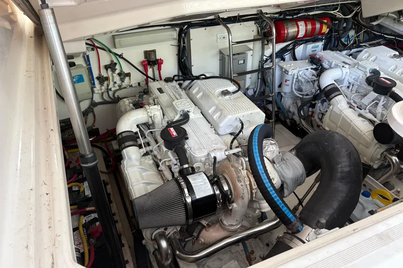 Slide: The Image of Engine room of a 2007 Tiara Yachts 3800 Open, showcasing dual engines and equipment. - 38