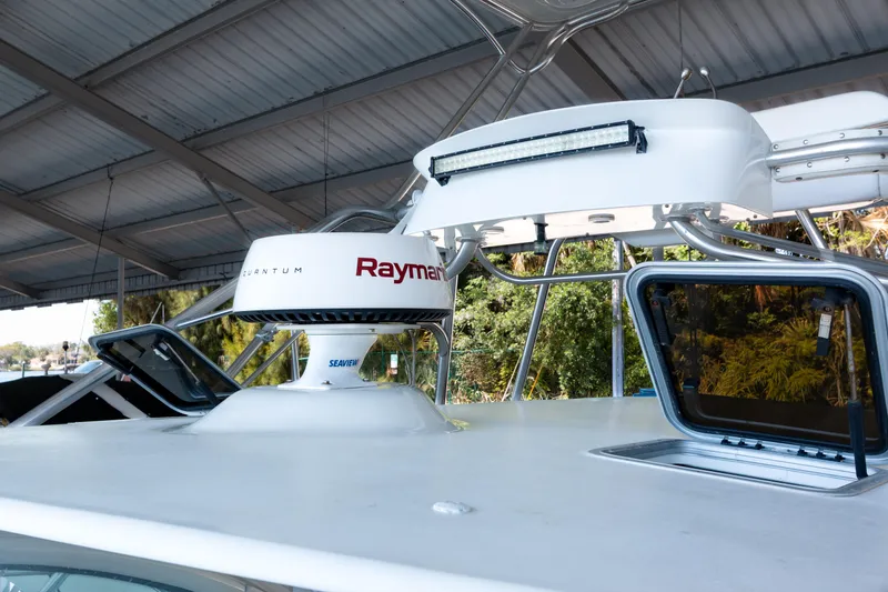 Slide: The Image of 2007 Tiara Yachts 3800 Open with Raymarine radar and open hatch on deck. - 8