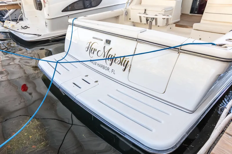 Slide: The Image of 2007 Tiara Yachts 3800 Open docked, named "Her Majesty," in Palm Harbor, FL. - 9