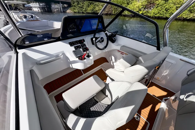 Slide: The Image of Modern STERK 31 boat interior, 2025 model, featuring sleek design and advanced navigation controls. - 10