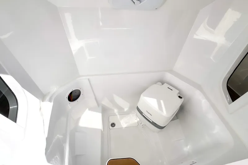 Slide: The Image of Compact bathroom in 2025 STERK 31 boat with modern white fixtures. - 17