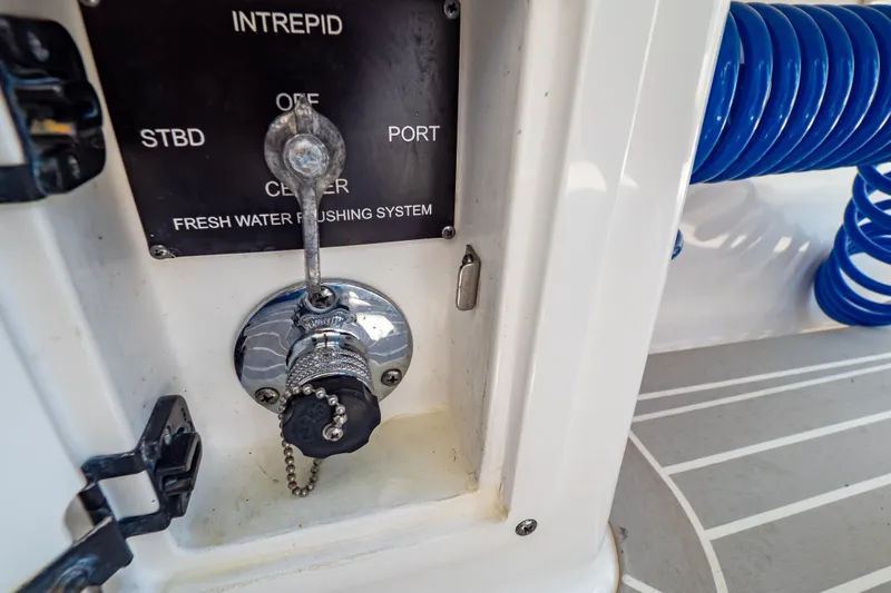 Slide: The Image of Control panel of 2016 Intrepid 400 Cuddy's fresh water flushing system. - 117