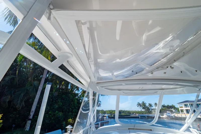 Slide: The Image of View from the deck of a 2016 Intrepid 400 Cuddy, showcasing clear skies and palm trees. - 118