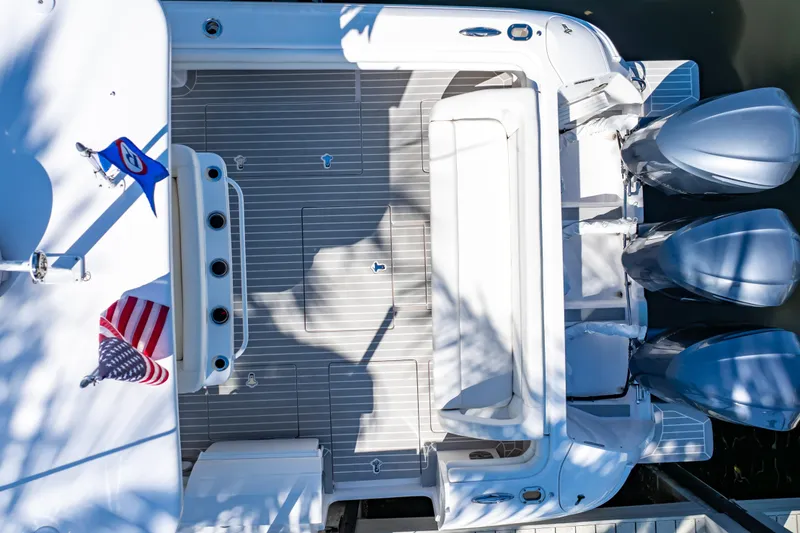 Slide: The Image of Overhead view of 2016 Intrepid 400 Cuddy boat deck with triple engines. - 135