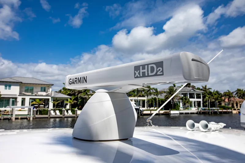 Slide: The Image of Garmin xHD2 radar on 2016 Intrepid 400 Cuddy boat, with waterfront homes in background. - 14