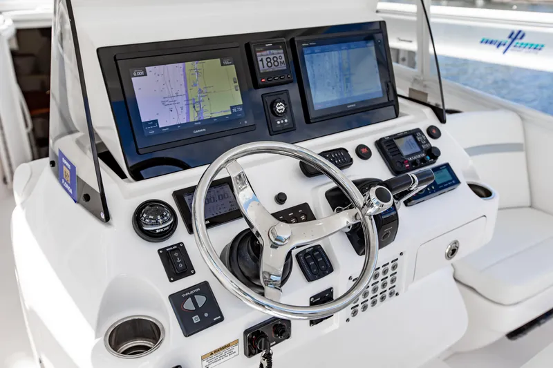 Slide: The Image of Intrepid 400 Cuddy 2016 helm with advanced navigation and control systems. - 2