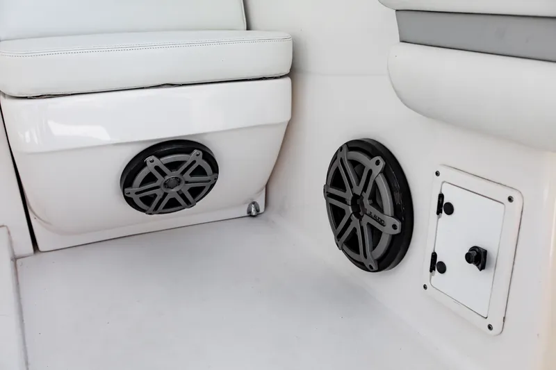 Slide: The Image of Interior of 2016 Intrepid 400 Cuddy featuring speakers and storage compartment. - 24