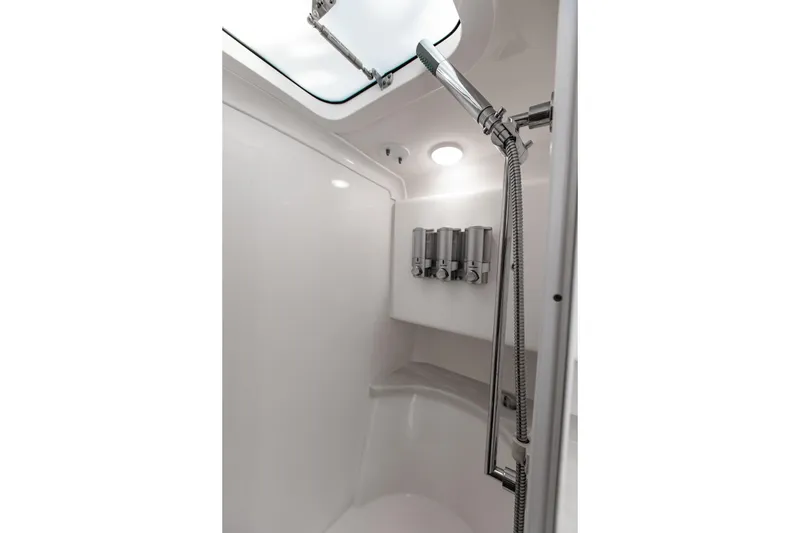 Slide: The Image of Interior shower of 2016 Intrepid 400 Cuddy boat with modern fixtures. - 36