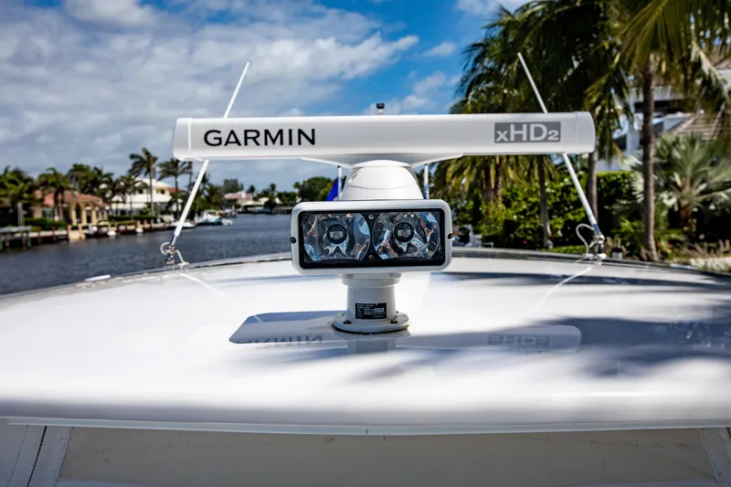 Slide: The Image of 2016 Intrepid 400 Cuddy boat with Garmin xHD2 radar on deck, tropical background. - 38
