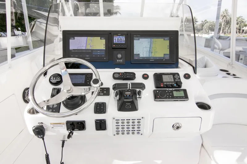 Slide: The Image of Helm of 2016 Intrepid 400 Cuddy with advanced navigation and control systems. - 75