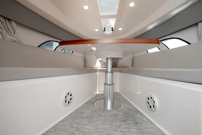 Slide: The Image of Interior of 2016 Intrepid 400 Cuddy boat with modern seating and table. - 84