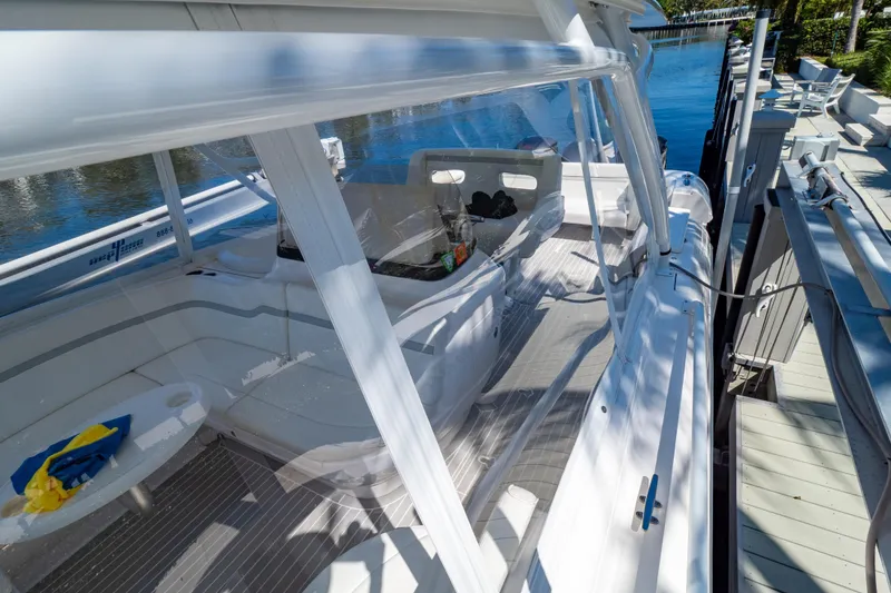Slide: The Image of 2016 Intrepid 400 Cuddy boat interior view at dockside. - 95
