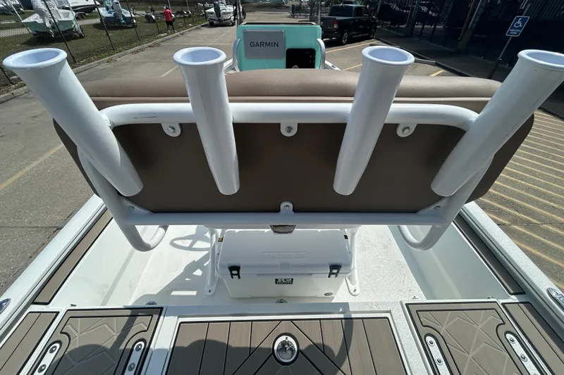 Slide: The Image of Avid 21 Mag 2026 boat with rod holders and Garmin equipment on deck. - 11