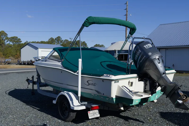Slide: The Image of 2004 Scout 175 Dorado boat with Yamaha outboard motor on trailer. - 3