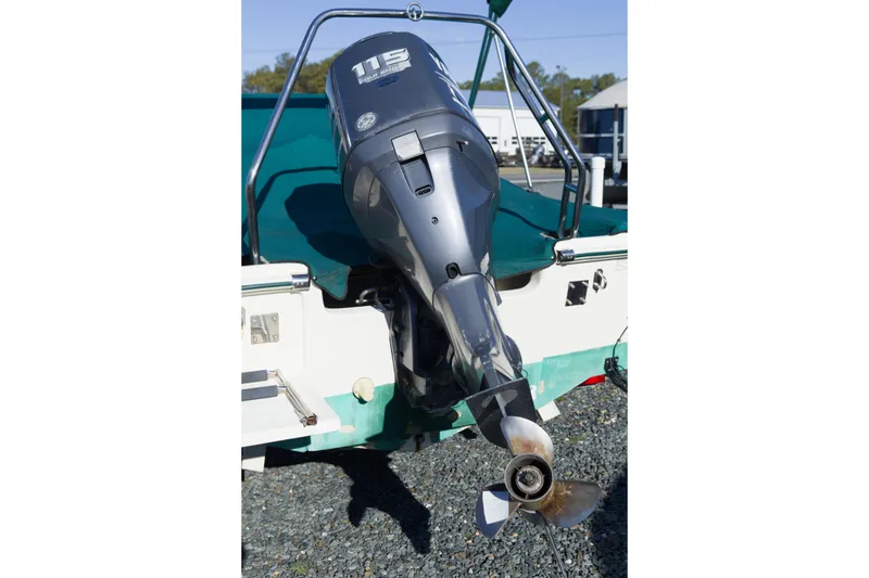 Slide: The Image of 2004 Scout 175 Dorado boat with 115 horsepower outboard motor, rear view. - 6