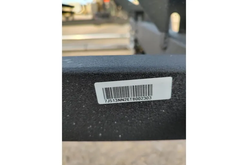 Slide: The Image of Barcode on Sun Tracker SportFish 20 DLX 2026 boat trailer frame. - 10