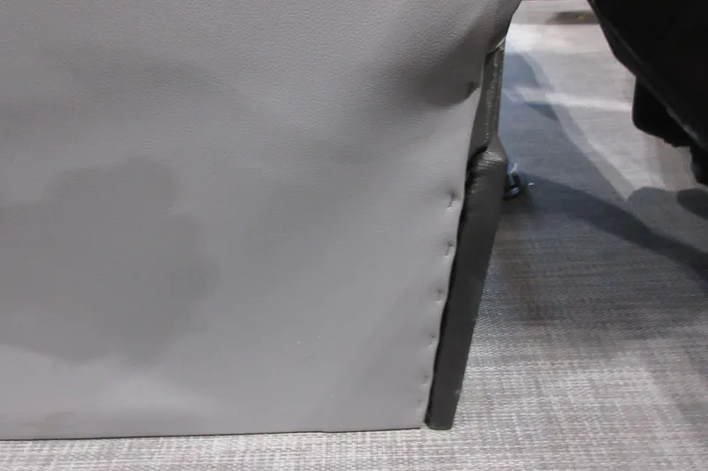 Slide: The Image of Gray upholstery detail on 2026 Sun Tracker SportFish 20 DLX boat seat. - 7