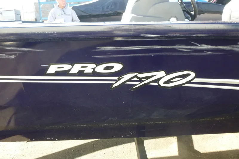Slide: The Image of 2021 Tracker Pro 170 boat side view with logo and stripe detailing. - 15