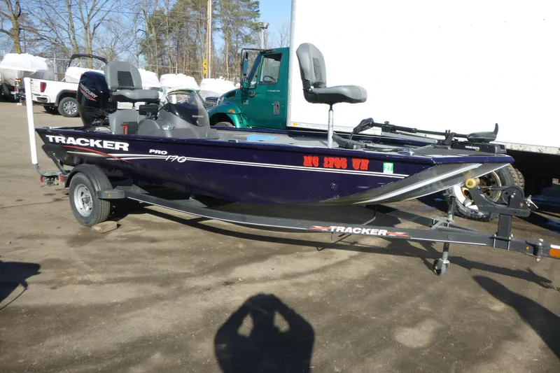 Slide: The Image of 2021 Tracker Pro 170 boat on trailer, parked outdoors. - 3