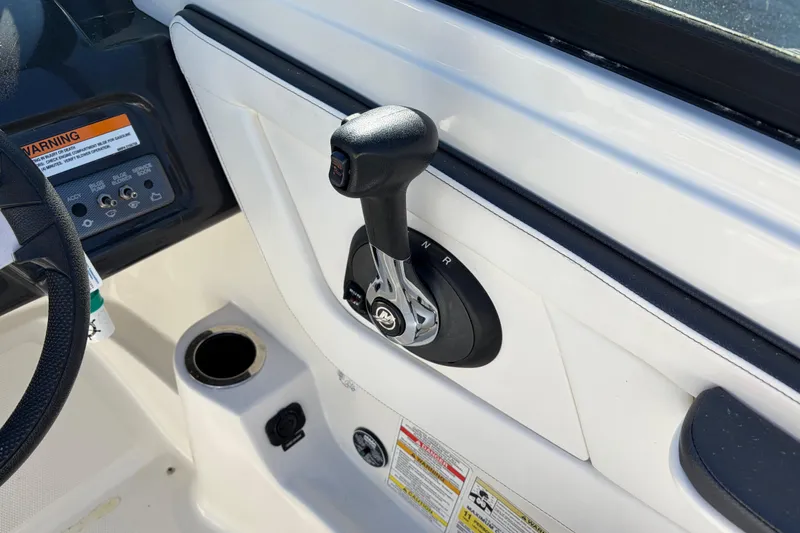 Slide: The Image of Throttle control of a 2015 Sea Ray 19 SPX boat, featuring a sleek design. - 16
