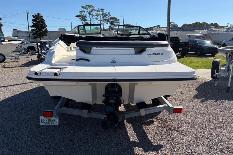 Slide: The Image of 2015 Sea Ray 19 SPX boat on trailer, rear view in outdoor setting. - 3