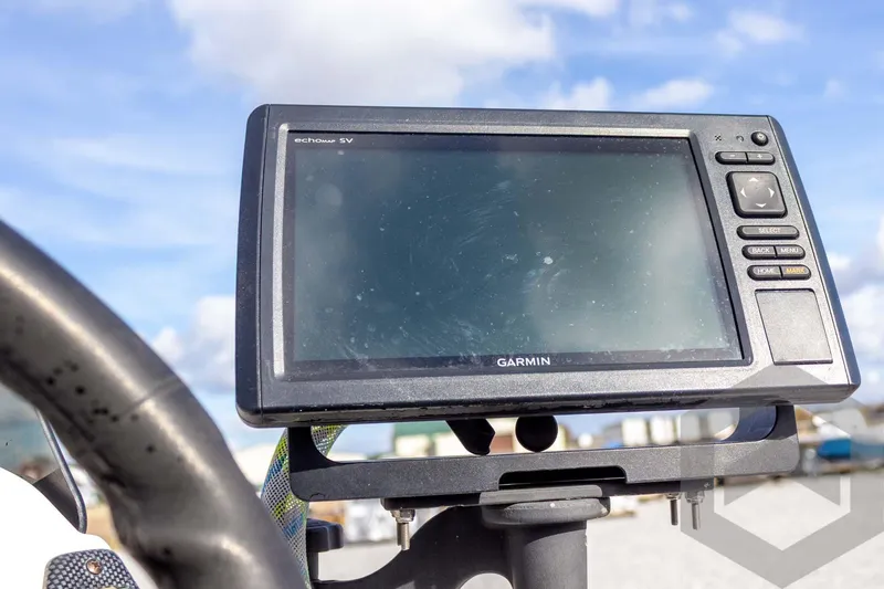Slide: The Image of Garmin EchoMap SV on Champion 193 CX boat, 2000 model, under clear sky. - 33