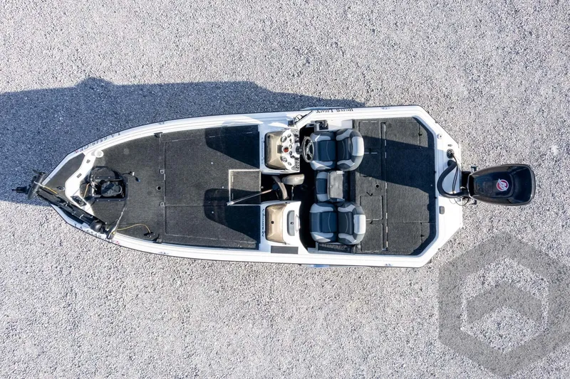 Slide: The Image of Aerial view of 2000 Champion 193 CX boat on gravel surface. - 44