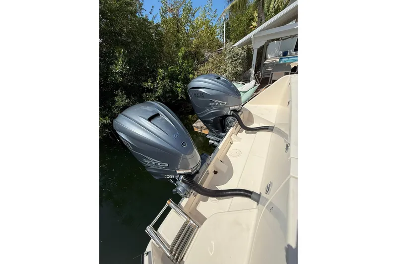 Slide: The Image of 2021 Grady-White Canyon 336 boat with dual Yamaha XTO outboard engines. - 10