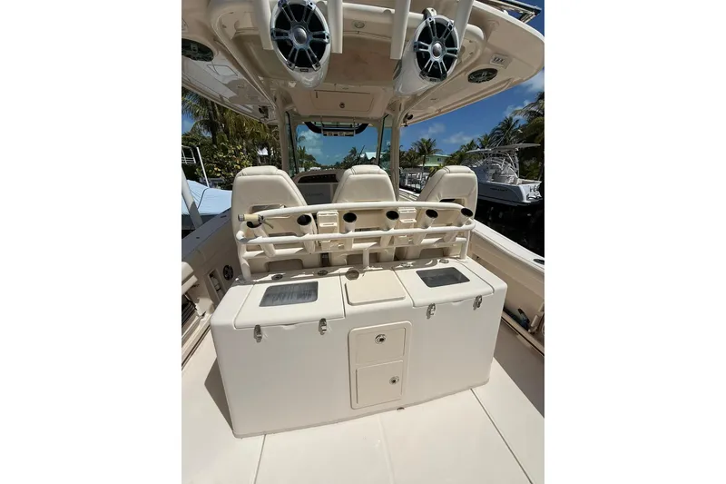 Slide: The Image of 2021 Grady-White Canyon 336 boat interior with seating and storage compartments. - 16