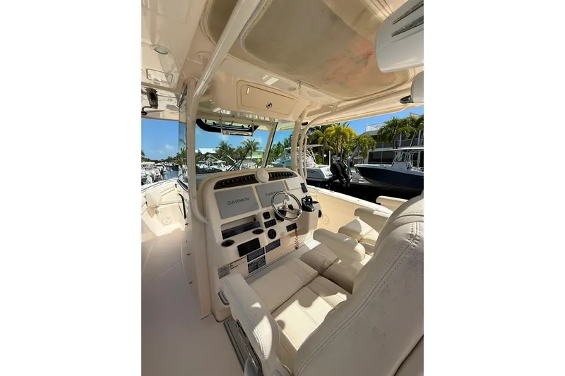 Slide: The Image of 2021 Grady-White Canyon 336 boat interior with Garmin navigation system. - 22